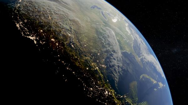 Satellite view of Earth at night showing the United States